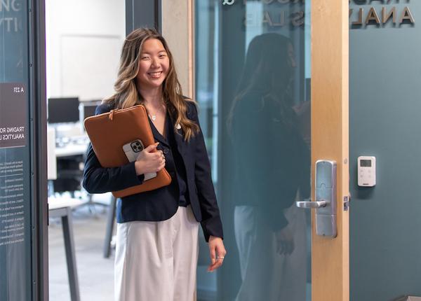 Student walking out of the analytics lab